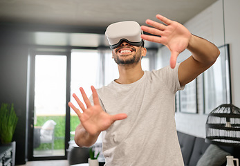 Image showing Technology, virtual reality and hands of man in home with headset for streaming interactive, online and 3d games. Futuristic, digital tech and guy with vr glasses for metaverse, cyberspace and gaming