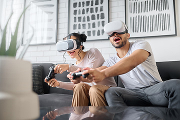 Image showing Virtual reality, gaming and metaverse with a couple playing video games in their home together for fun or enjoyment. VR, game and 3d ai with a man and woman gamer bonding in a house living room