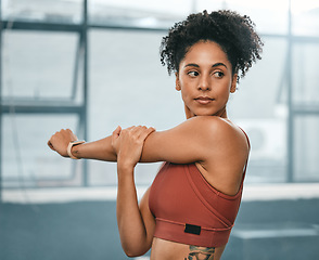 Image showing Black woman, thinking and exercise stretching arms for fitness workout, wellness training or cardio runner lifestyle. African athlete, healthy warm up motivation and mindset vision in sports gym