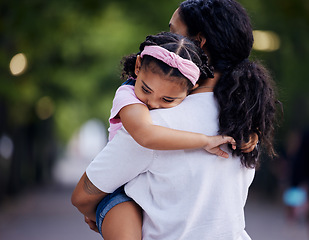 Image showing Love, sad and mother carrying girl outdoors, bonding and hugging. Motherhood support, family care and woman embrace, hug or cuddle to comfort angry kid or child with anxiety, depression or problems.