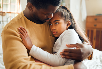 Image showing Sick, illness and father with his child with pain, sad or problem in her bedroom at their home. Ill, care and African dad holding his girl kid with concern while she has the flu, cold or fever.