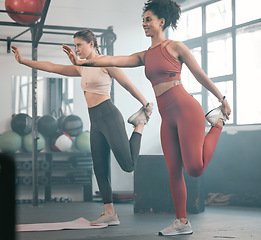 Image showing Fitness, stretching and training with women in gym for teamwork, workout and exercise. Friends, health and personal trainer with girl and muscle warm up for wellness, sports and progress goals