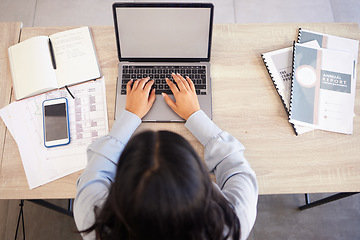 Image showing Top view, laptop and business woman typing email, report or proposal in office workplace mock up. Computer, research and female employee planning sales, advertising or marketing strategy in company.