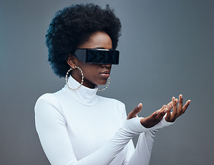 Image showing Futuristic sunglasses, fashion and black woman, gen z youth and stylish with trendy designer brand against studio background. Young model, cyberpunk and natural curly hair with beauty and edgy style