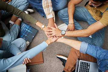 Image showing Teamwork, hands and group of students in university for collaboration, unity or motivation. Support, solidarity and people or friends huddle for education goals, learning targets or success mindset.