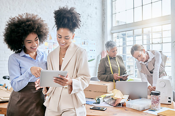 Image showing Planning, tablet and fashion with business people in ecommerce warehouse for retail, designer and creative. Industry, delivery and logistics with women in factory for product, cargo and box shipping