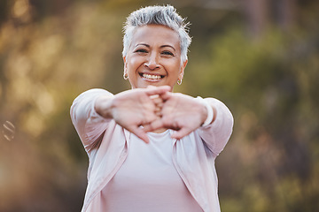 Image showing Fitness, portrait or old woman stretching in nature to start training, hiking exercise or workout in a park in Portugal. Happy, warm up or healthy senior person smiles with pride, goals or motivation