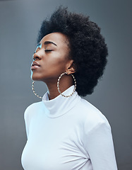 Image showing Calm, relax and black woman with peace and a positive mindset in a studio for mindfulness and balance. Relaxing, breathe and African female model with mental wellness isolated by a gray background.