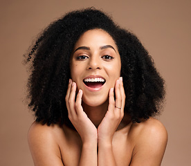 Image showing Face portrait, skincare and surprise of black woman in studio isolated on a brown background. Makeup cosmetics, wow and happy female model shocked at facial transformation after spa skin treatment.