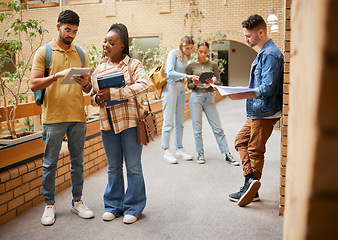 Image showing Students, college and education, tablet and books for learning, scholarship and collaboration in campus hallway. University with people studying together, learn with diversity and academic goals