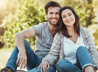 Image showing Couple, park and portrait of young people with love, care and bonding together in nature. Lens flare, smile and happy woman and man in sunshine feeling happiness from engagement and commitment