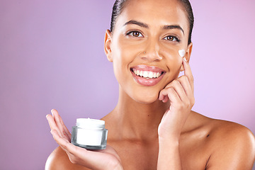 Image showing Woman, skincare cream and portrait with smile, cosmetic beauty and healthy facial by lavender background. Model, face and cosmetics for natural glow, happiness and product by purple studio background