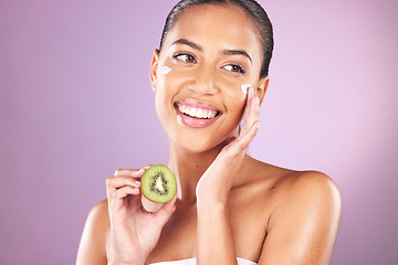 Image showing Cream, kiwi and skincare woman in studio mock up for facial wellness, healthy glow and cosmetics advertising. model smile for vitamin c, nutrition or green fruit of dermatology product and self love