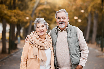 Image showing Portrait, love and senior couple in nature, bonding and retirement together. Romantic, mature man and elderly woman walking, loving and peace for marriage, forest and fresh air outdoor, smile and hug