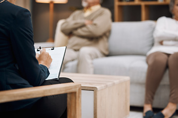 Image showing Psychologist writing, divorce and couple in therapy, conversation and session in office. Therapist make notes, senior man and elderly woman with relationship problems, marriage issue and frustrated.