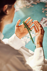 Image showing Praying, worship and hands of a man in a mosque for hope, faith and holy support during Ramadan. Prayer, gratitude and Islamic person with trust in God, spiritual and respect for Arabic religion