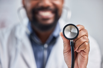 Image showing Doctor, healthcare and closeup of stethoscope in hospital for a heart or lung consultation. Professional, cardiology and nurse with medical equipment to examine chest or breathing in medicare clinic.