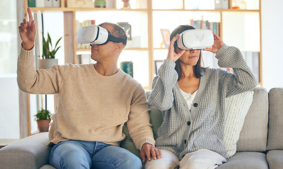 Image showing Virtual reality, 3d and a couple in the interactive metaverse while together on a sofa in the living room of a home. VR, goggles and gaming with a man and woman in their house to relax or video game