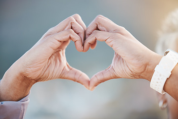 Image showing Hands, heart sign and senior woman in nature for healthy workout, exercise or training outdoors. Sports, fitness and retired female with gesture for love emoji, affection or romance, support and care