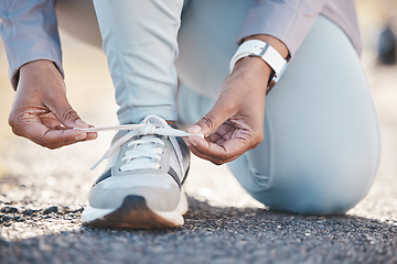 Image showing Woman, hands and shoelace for street runner, outdoor workout and fitness in summer sunshine in morning. Running adventure, shoes and tie lace for safety, speed and balance in road exercise for health