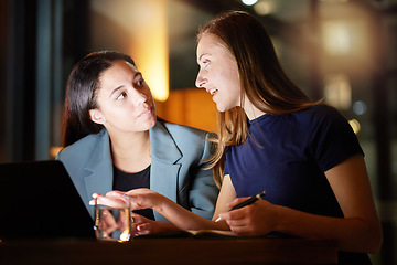 Image showing Business woman, laptop and talking at night in office planning report deadline, strategy discussion and teamwork overtime. Business people, late meeting and tech marketing training at workplace desk