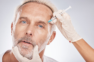 Image showing Botox, face and portrait of a senior man doing a cosmetic anti aging treatment in the studio. Plastic cosmetology, filler and elderly guy with wrinkles getting a silicone injection by gray background