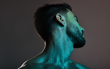 Image showing Skincare, beauty and man with neon lights in studio for cosmetics, grooming and self care treatment. Creative art, design and blue lighting on male fashion model for satisfaction, wellness and style