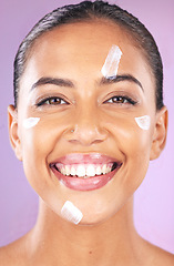 Image showing Woman face, skincare and beauty cream with smile for dermatology, health and wellness of natural glow skin on purple background. Portrait of aesthetic cosmetic model in studio with sunscreen product