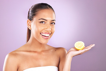 Image showing Skincare, lemon and woman in studio mockup for beauty, cosmetics and wellness with vegan, health or vitamin c promotion on purple background. Skin care model and fruit for natural dermatology results