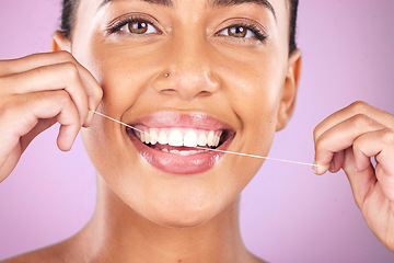 Image showing Woman portrait, face or flossing teeth on studio background in hygiene mouth maintenance, self care grooming or healthcare wellness routine. Zoom, happy smile or beauty model in dental floss cleaning