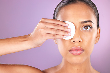 Image showing Skincare, beauty and woman with cotton pad in studio for wellness, dermatology and facial treatment. Spa aesthetic, luxury cosmetics and portrait of Latina girl for face cleansing, hygiene and makeup