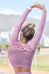 Image showing Fitness, exercise and woman stretching outdoor in summer in a city for health, wellness and a healthy body. Back of a sports female or runner ready for cardio training, workout and morning routine