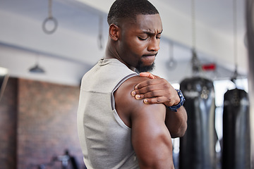 Image showing Exercise, black man and shoulder pain for training, fitness and workout for wellness in gym. Nigerian male, athlete and body care with pain, tired and injury for ache, strong and orthopedic problem