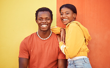 Image showing Black couple, youth and fashion with gen z, hug and together with color and portrait against wall background. Black man, black woman and young with trendy streetwear, mockup and marketing in Nigeria.