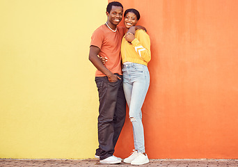 Image showing Portrait, love and mockup with a black couple dating outdoor on a color wall background together with mockup. Happy, smile and trust with a man and woman bonding while out in town on a summer day