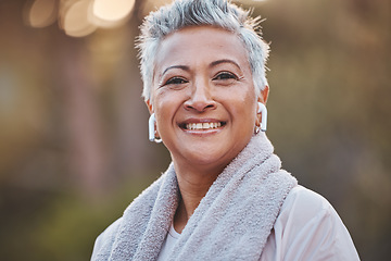 Image showing Fitness, nature and portrait of a old woman with music while outdoor for exercise in nature with earphones. Face of elderly female in a forest for a cardio workout for a healthy lifestyle and energy