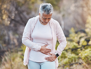 Image showing Exercise, pain and senior woman with injury, park and fitness for wellness, health and emergency. Mature female, athlete and joint massage with muscle sprain, fibromyalgia and retirement in nature