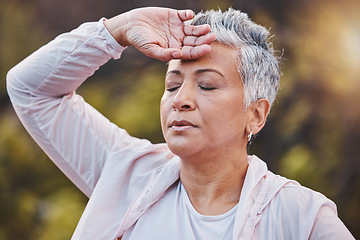 Image showing Tired runner, senior woman and breathing outdoor for fitness exercise, running rest and workout training. Nature forest, elderly athlete and closed eyes for breathe, cardio break and sports wellness