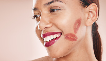 Image showing Makeup, lipstick and beauty of a happy woman with color or shade of cosmetics on a studio background. Face of aesthetic model with a smile, glow and healthy skin for dermatology and salon mockup