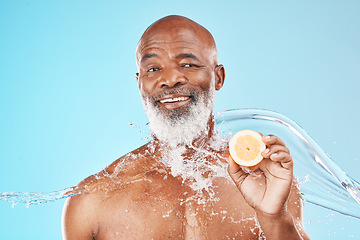 Image showing Black man in studio shower with lemon for skincare health, vegan product or senior cosmetics advertising, marketing or promotion mockup. Beauty model, water splash and juice fruit for clean benefits