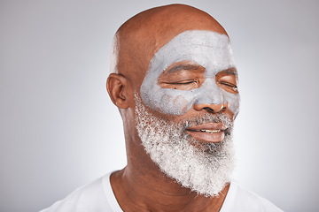 Image showing Skincare, beauty or senior black man with face mask marketing or advertising a luxury beauty product for self care. Studio background, facial cosmetics or African old man relaxing with a happy smile