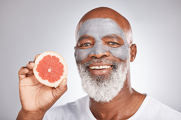 Image showing Beauty, grapefruit or happy old man with face mask marketing or advertising skincare or healthy diet. Studio background, fruit or senior black man with a happy smile grooming with natural cosmetics