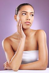 Image showing Skincare, beauty and woman with hands on face for cosmetology, beauty products and dermatology. Cosmetics, makeup and Latino girl on purple background for wellness, facial treatment and spa aesthetic