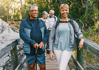 Image showing Portrait, hiking or couple of senior friends in nature trekking, walking or hiking for peace or freedom. Travel adventure, partnership or happy elderly people enjoy fun bonding, fitness or exercise