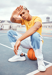 Image showing Basketball, fashion and portrait of black man on basketball court with hand frame for beauty, style and outfit. Sports, leisure and and male model with hand frame and edgy clothes in urban park