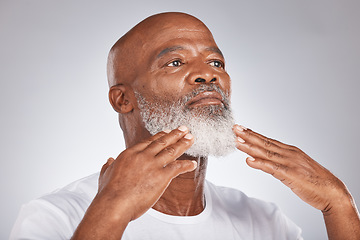 Image showing Black man, face and senior self care for beard and facial. hair while grooming or shaving for clean skin. Headshot of African male on grey studio background for beauty, skincare and dermatology