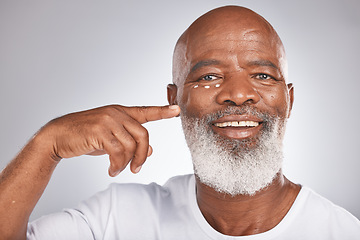 Image showing Beauty, face cream and skincare of black man in studio for self care with skincare, dermatology and cosmetics. Portrait of happy senior male with lotion on skin for glow, health and wellness on grey