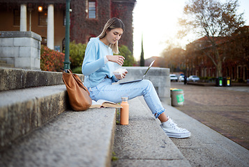 Image showing College, study and food with woman and laptop for education, lunch break and academy research. University, knowledge and goal with girl student and sandwich on stairs of campus for relax and learning