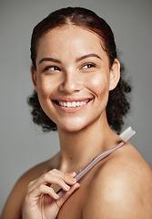 Image showing Toothbrush, woman brushing teeth and dental wellness with hygiene, cleaning and teeth whitening. Face of a happy female with a smile for oral health, healthy mouth and self care on studio background