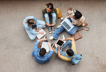 Image showing Study, laptop and group of students on floor in project, research or planning, brainstorming and teamwork. Notebook, education and top of university student, friends or people collaboration in school